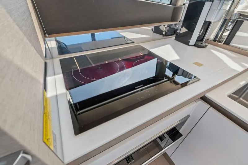 No Patience Yacht Photos Pics Modern kitchen in 2022 Prestige 520 yacht with sleek induction cooktop.