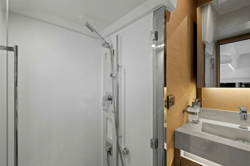 No Patience Yacht Photos Pics Modern bathroom in 2022 Prestige 520 yacht with sleek shower and elegant sink.