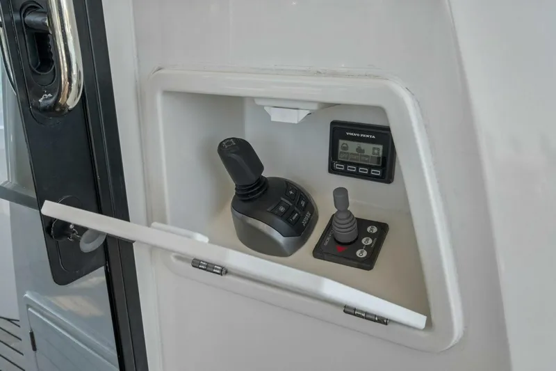 No Patience Yacht Photos Pics Control panel of 2022 Prestige 520 yacht featuring joystick and display.