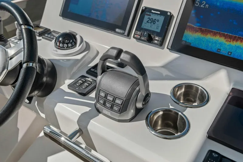 No Patience Yacht Photos Pics Control panel of 2022 Prestige 520 yacht with navigation instruments and cup holders.