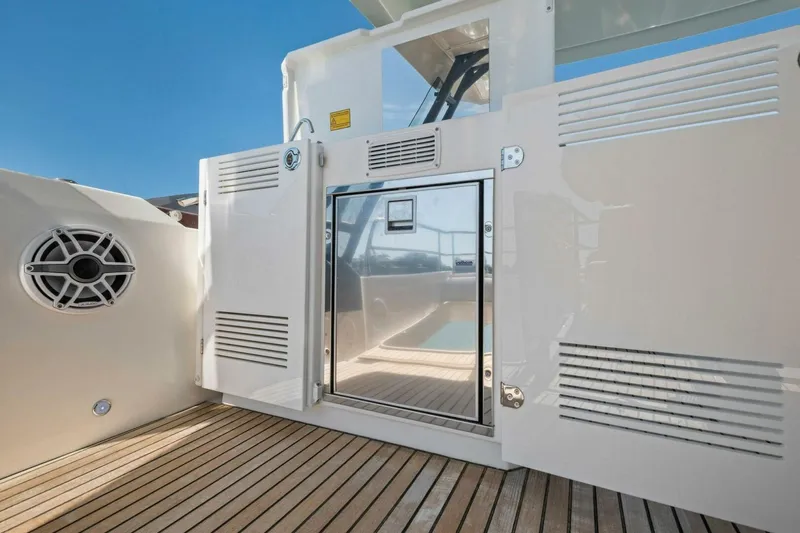 No Patience Yacht Photos Pics Luxury yacht deck with sleek design, featuring Prestige 520 model, 2022.