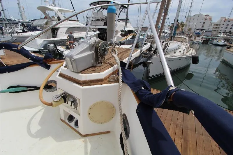  Yacht Photos Pics 1989 Grand Banks Classic yacht docked in marina, showcasing deck and winch details.