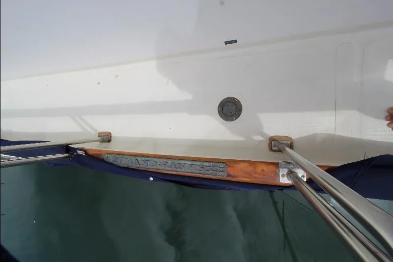  Yacht Photos Pics 1989 Grand Banks Classic yacht deck with railing and water reflection.