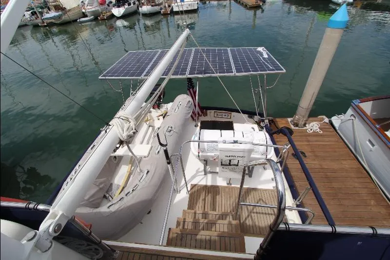  Yacht Photos Pics 1989 Grand Banks Classic yacht with solar panels docked at marina.