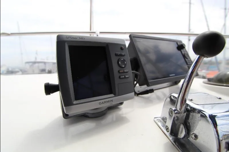  Yacht Photos Pics Garmin GPS and controls on 1989 Grand Banks Classic yacht dashboard.