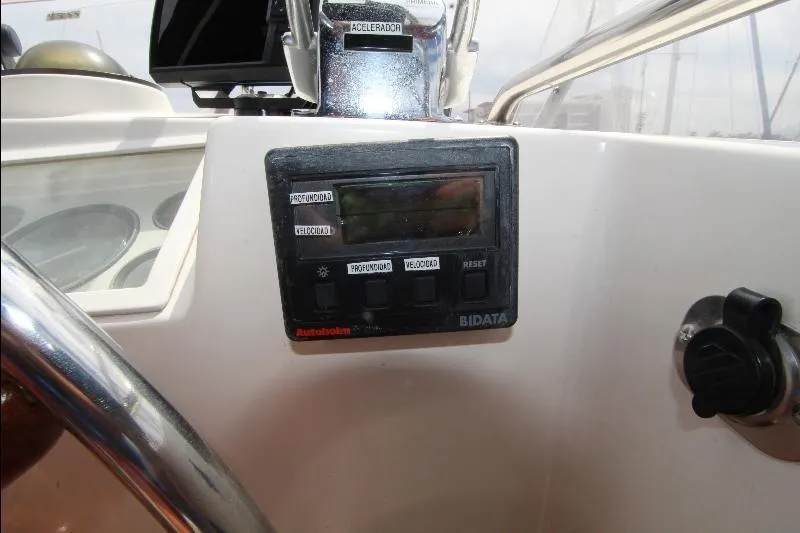  Yacht Photos Pics Control panel on a 1989 Grand Banks Classic boat dashboard.