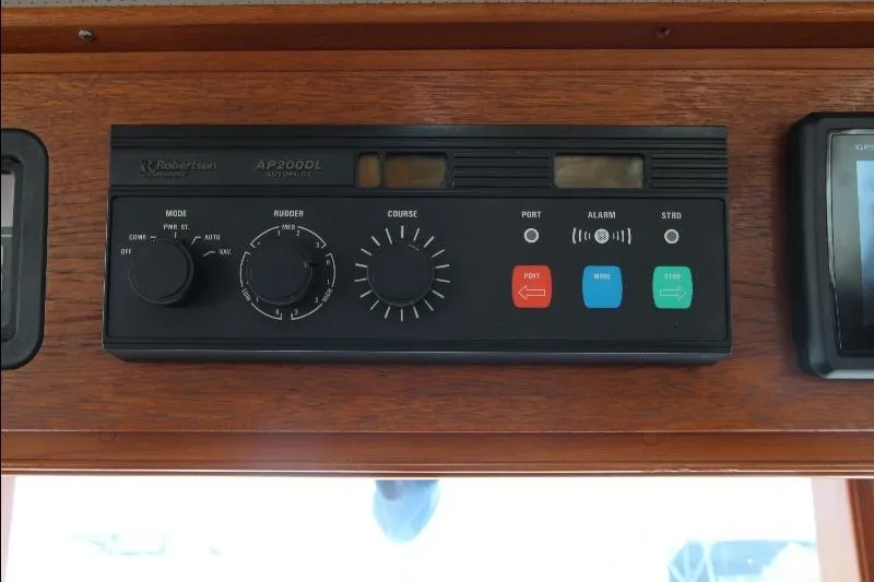  Yacht Photos Pics Autopilot control panel on 1989 Grand Banks Classic boat dashboard.