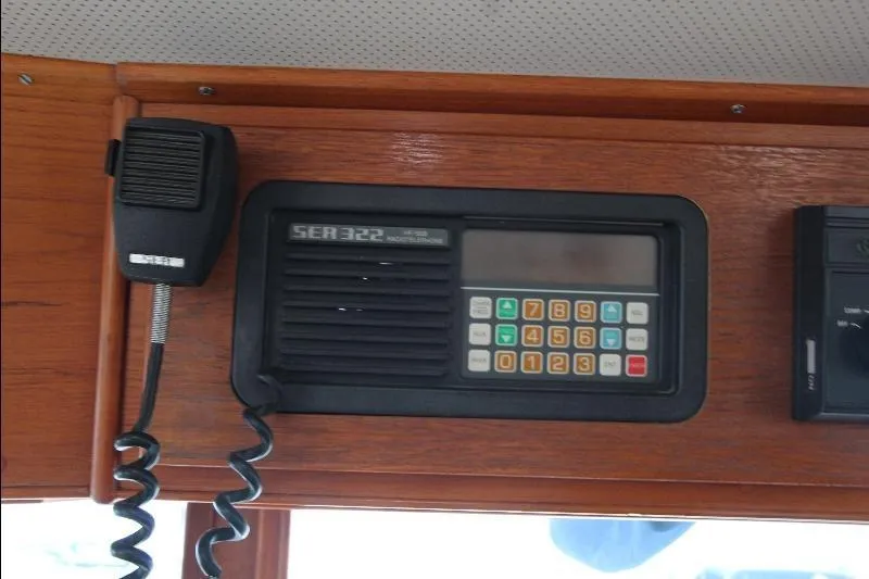  Yacht Photos Pics Radio communication system on 1989 Grand Banks Classic boat dashboard.