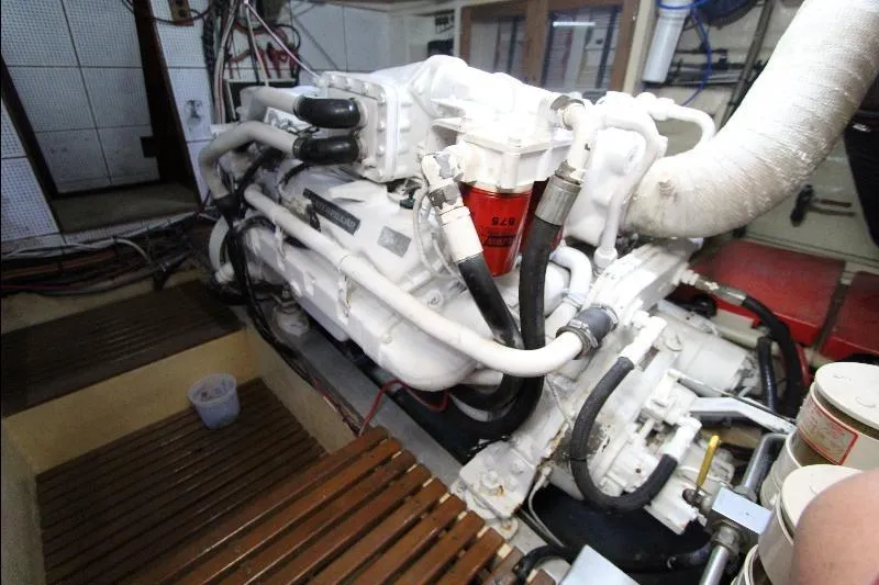  Yacht Photos Pics Engine room of 1989 Grand Banks Classic yacht, showcasing detailed mechanical components.