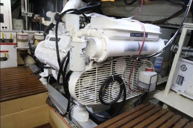  Yacht Photos Pics Engine room of 1989 Grand Banks Classic boat with Caterpillar engine components.