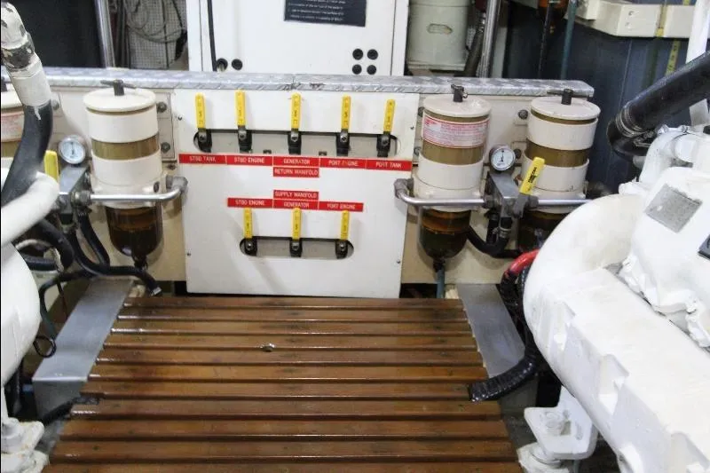  Yacht Photos Pics Engine room of 1989 Grand Banks Classic with fuel filters and control panel.