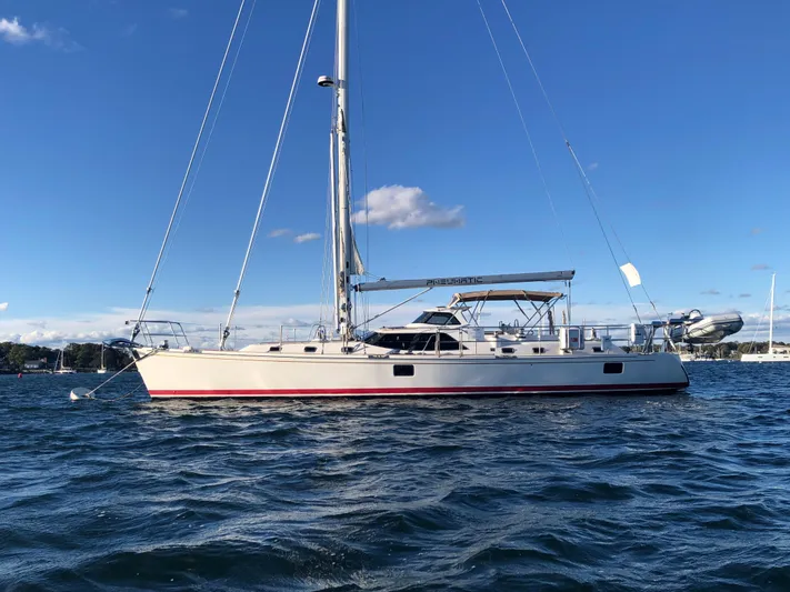 Pneumatic Yacht Photos Pics Sailing yacht Outbound 56, 2020 model, anchored on a sunny day with clear skies.