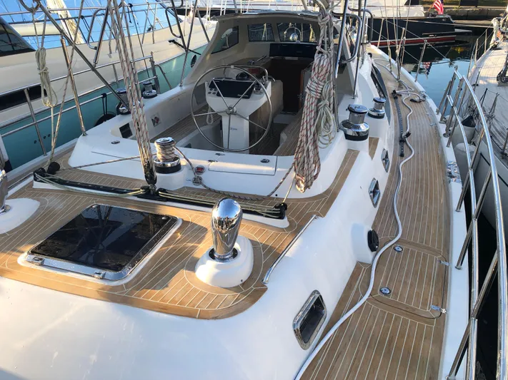 Pneumatic Yacht Photos Pics Sleek 2020 Outbound 56 yacht with polished deck and modern cockpit design.