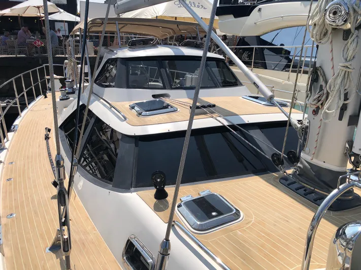 Pneumatic Yacht Photos Pics Outbound 56 yacht, 2020 model, featuring sleek design and spacious deck.