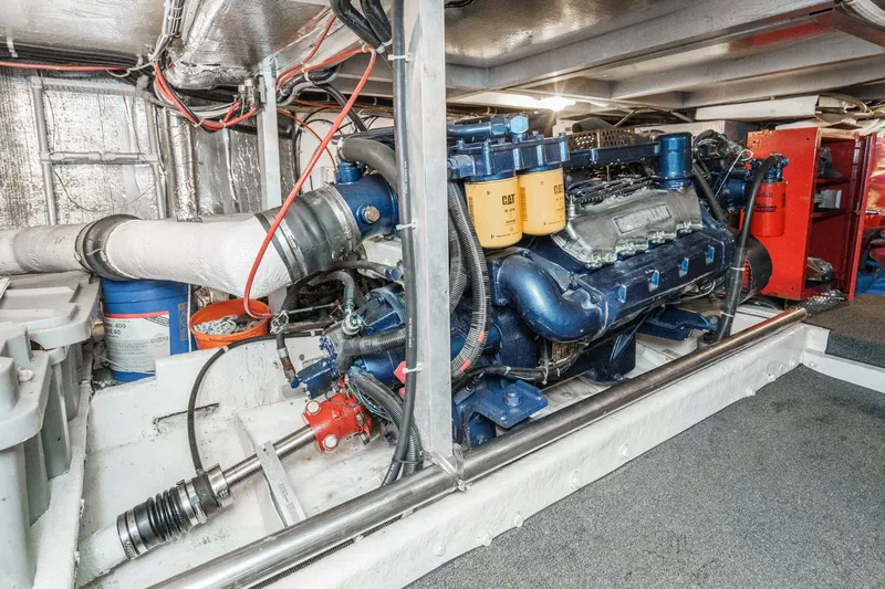Shady Lady Yacht Photos Pics Engine room of a 1995 Navigator Classic yacht, featuring a Caterpillar engine.