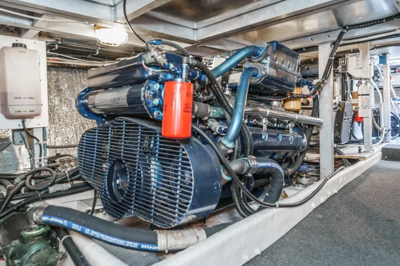 Shady Lady Yacht Photos Pics Engine room of a 1995 Navigator Classic yacht, showcasing detailed machinery and components.
