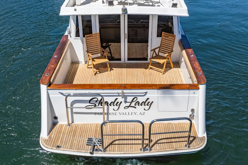 Shady Lady Yacht Photos Pics 1995 Navigator Classic yacht "Shady Lady" with wooden deck and chairs, Paradise Valley, AZ.