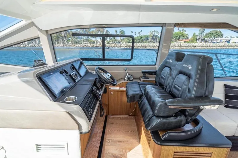  Yacht Photos Pics Premium leather seating and state of art helm station &nbsp;with joystick&nbsp; controls and simrad integration.