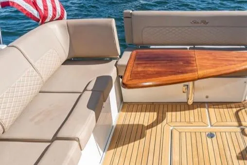  Yacht Photos Pics 2017 Sea Ray 460 Sundancer yacht with elegant seating and wooden table on deck.