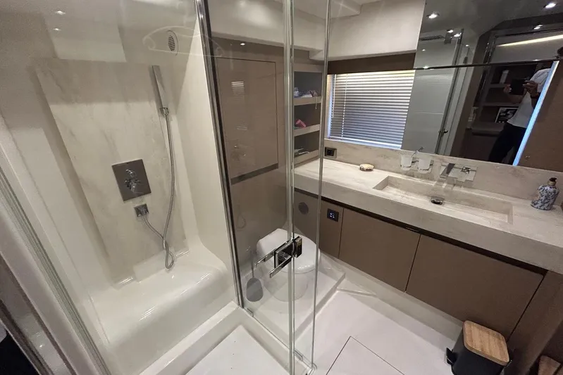  Yacht Photos Pics Luxurious bathroom in 2018 Prestige 680S yacht with modern shower and sleek vanity.