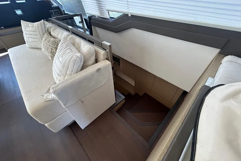  Yacht Photos Pics Interior of 2018 Prestige 680S yacht with elegant seating and staircase.
