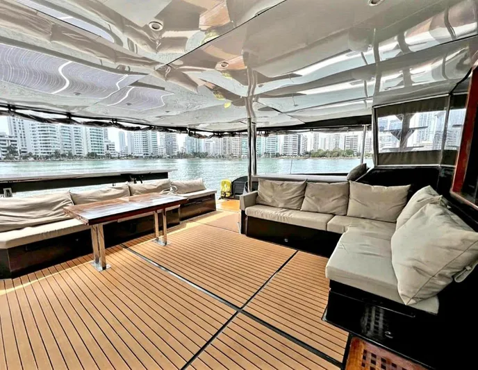 Octopus Yacht Photos Pics Spacious deck of 2017 Fountaine Pajot Ipanema 58 Power Catamaran with waterfront view.