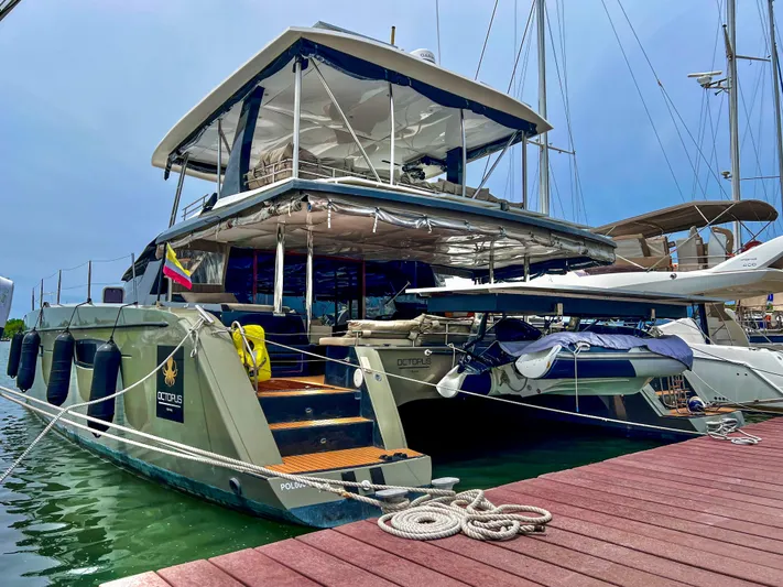 Octopus Yacht Photos Pics 2017 Fountaine Pajot Ipanema 58 Power Catamaran docked at marina.