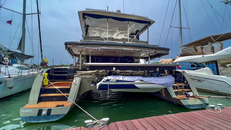 Octopus Yacht Photos Pics 2017 Fountaine Pajot Ipanema 58 Power Catamaran docked at marina.
