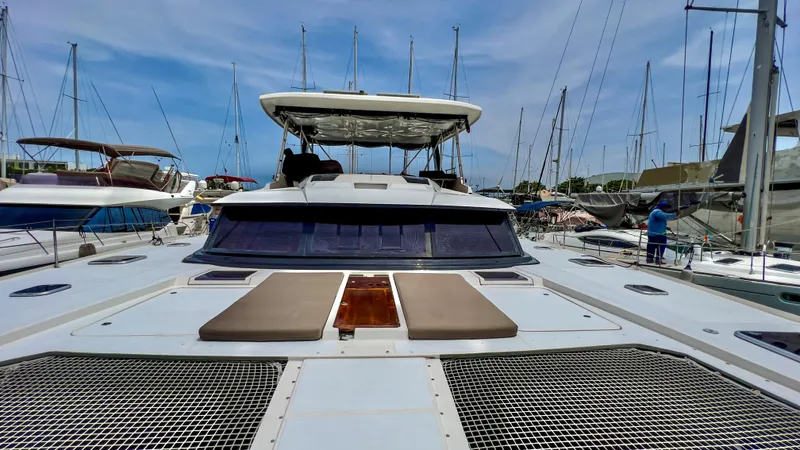 Octopus Yacht Photos Pics 2017 Fountaine Pajot Ipanema 58 Power Catamaran docked at marina.