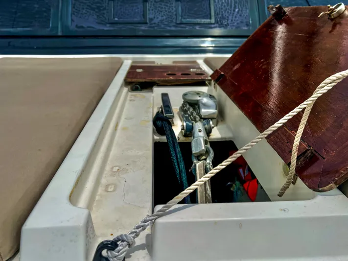 Octopus Yacht Photos Pics 2017 Fountaine Pajot Ipanema 58 Power Catamaran deck storage compartment with ropes and equipment.