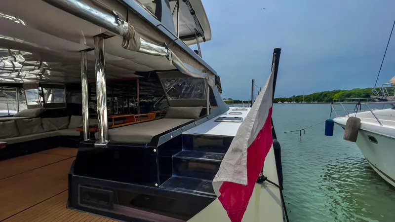 Octopus Yacht Photos Pics 2017 Fountaine Pajot Ipanema 58 Power Catamaran docked at marina.