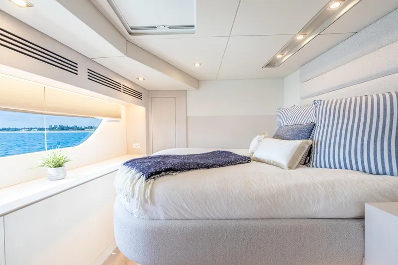  Yacht Photos Pics Luxurious bedroom interior on Two Oceans 555 - 008 yacht, 2025 model, with ocean view.