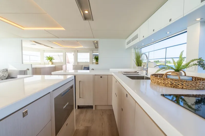  Yacht Photos Pics Luxurious yacht interior with modern kitchen design, featuring sleek countertops and elegant decor, Two Oceans 555 - 008.