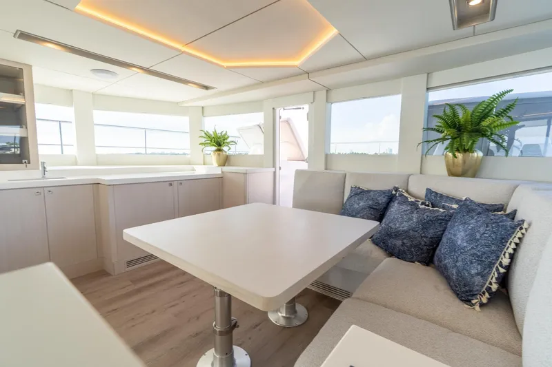  Yacht Photos Pics Luxurious interior of 2025 Two Oceans 555-008 yacht with modern seating and decor.