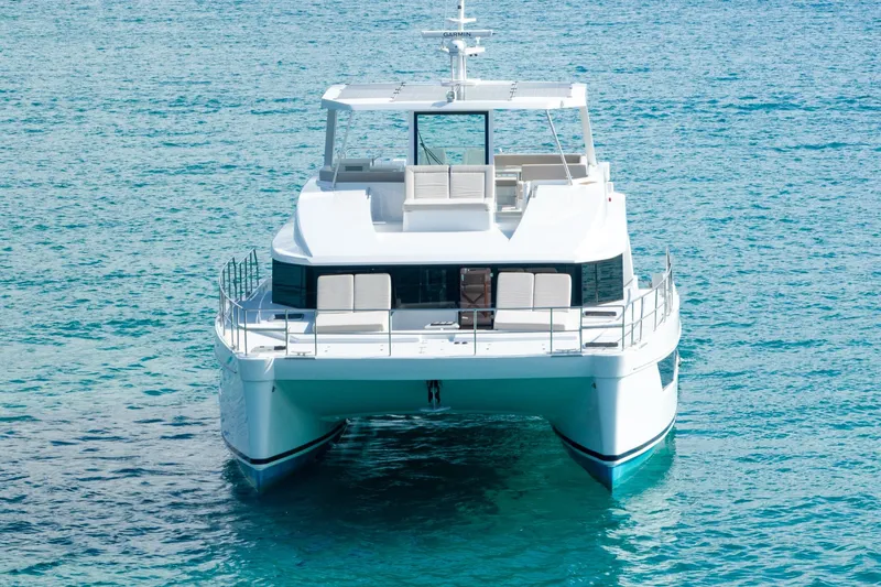  Yacht Photos Pics Luxury catamaran "Two Oceans 555 - 008" on clear blue water, 2025 model.