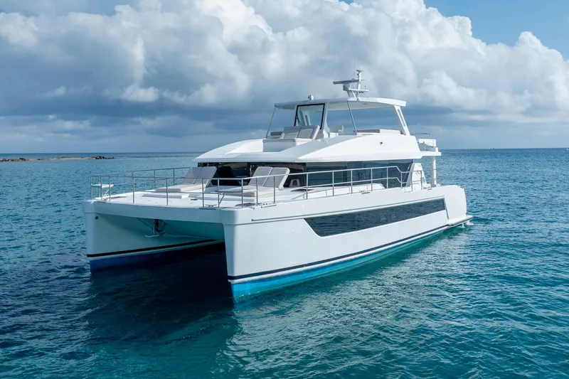  Yacht Photos Pics Luxury Two Oceans 555 - 008 catamaran yacht on serene ocean, 2025 model.