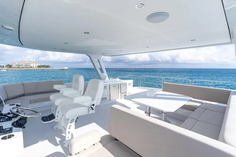  Yacht Photos Pics Luxurious 2025 Two Oceans 555-008 yacht deck with ocean view and modern seating.