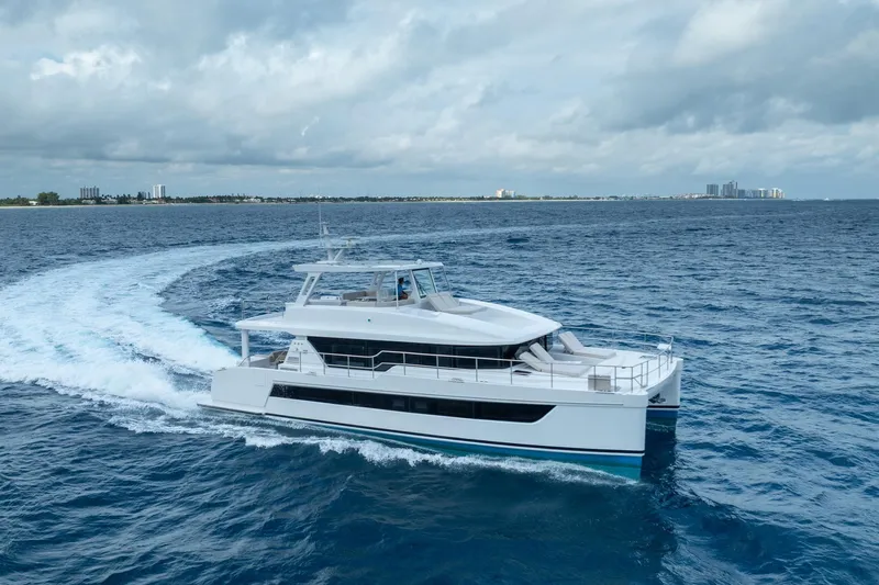  Yacht Photos Pics Luxury yacht Two Oceans 555 - 008 cruising on open sea, 2025 model.