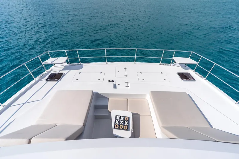  Yacht Photos Pics Luxury yacht deck with sun loungers, ocean view; Two Oceans 555 - 008, 2025 model.