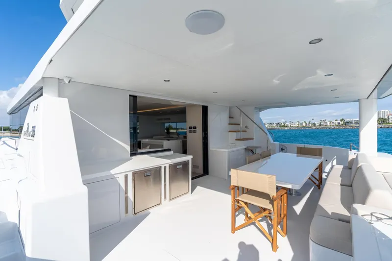  Yacht Photos Pics Luxurious Two Oceans 555 - 008 yacht deck with dining area, ocean view, 2025 model.