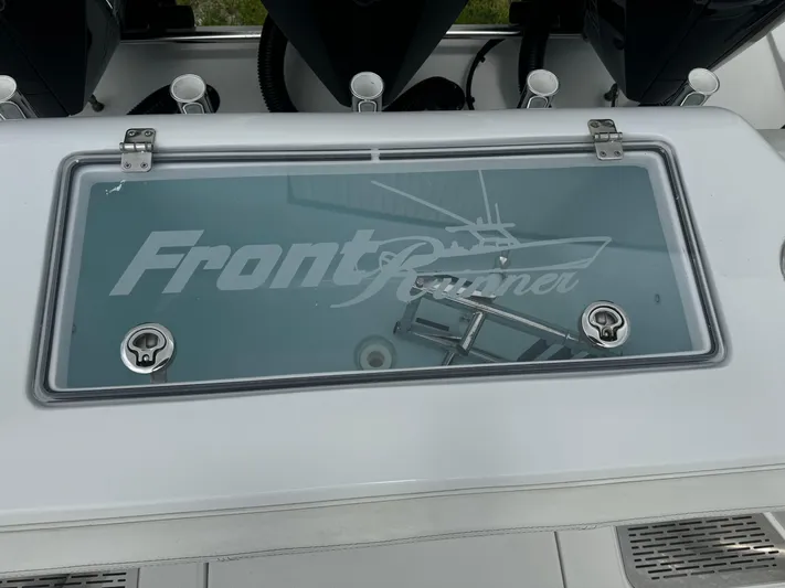  Yacht Photos Pics 2023 Front Runner 36 Center Console boat livewell with logo on glass lid.