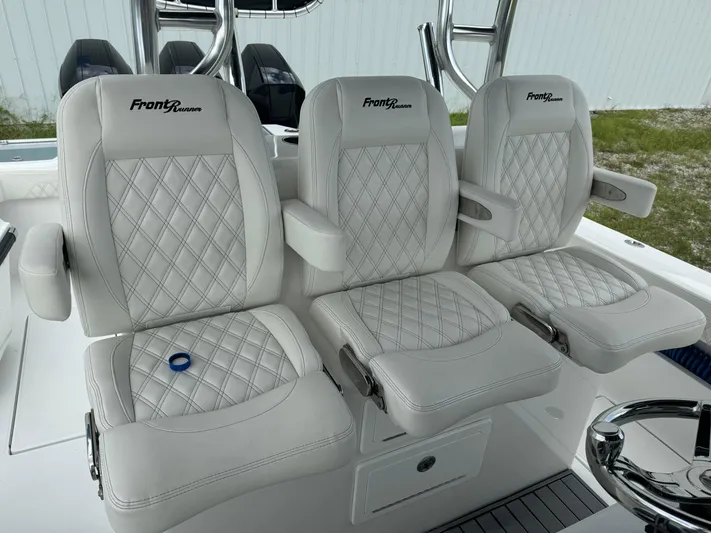  Yacht Photos Pics 2023 Front Runner 36 Center Console boat seats with diamond stitching and armrests.
