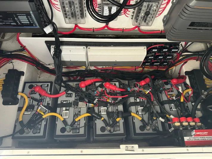  Yacht Photos Pics 2023 Front Runner 36 Center Console battery compartment with wiring and electrical components.