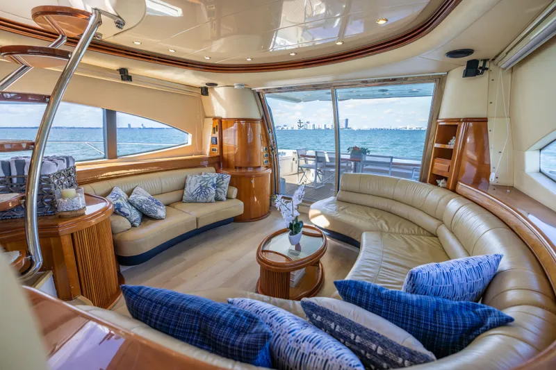 Freedom Yacht Photos Pics Luxurious interior of 2005 Azimut 68 yacht with elegant seating and ocean view.