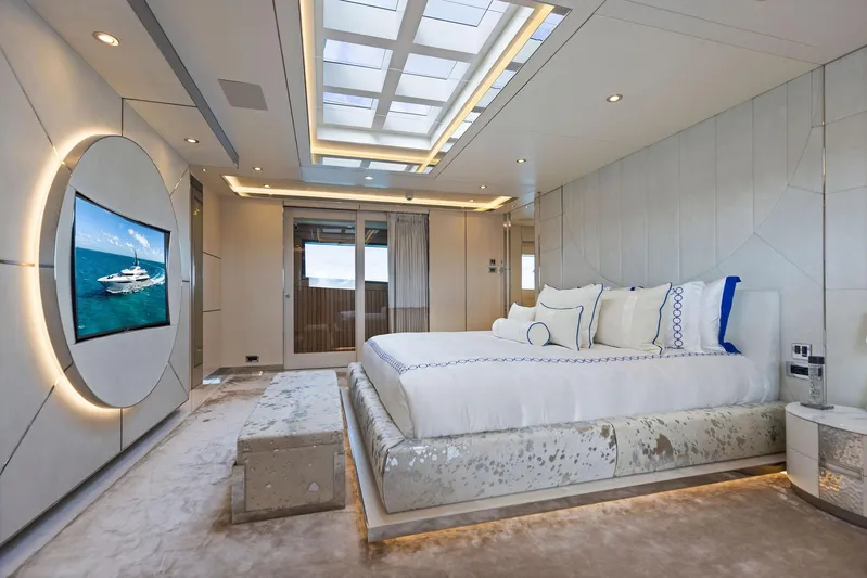 Moonraker Yacht Photos Pics Luxurious bedroom interior on Bilgin 156 yacht, featuring modern design and elegant furnishings.