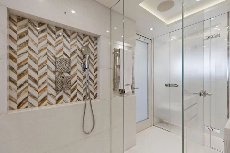 Moonraker Yacht Photos Pics Luxurious Bilgin 156 yacht bathroom with glass shower and elegant tile design, 2019 model.