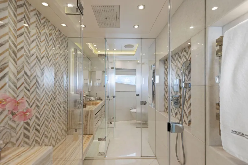 Moonraker Yacht Photos Pics Luxurious bathroom in 2019 Bilgin 156 yacht with glass shower and elegant tile design.