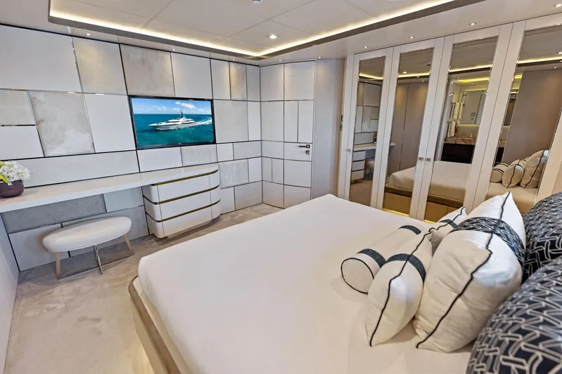 Moonraker Yacht Photos Pics Luxurious bedroom interior on Bilgin 156 yacht, featuring modern design and elegant furnishings.