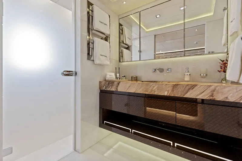 Moonraker Yacht Photos Pics Luxurious bathroom interior on Bilgin 156 yacht, featuring elegant marble countertop and modern fixtures.