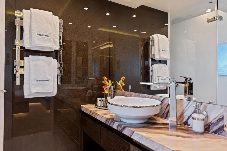 Moonraker Yacht Photos Pics Luxurious bathroom in 2019 Bilgin 156 yacht with elegant sink and plush towels.